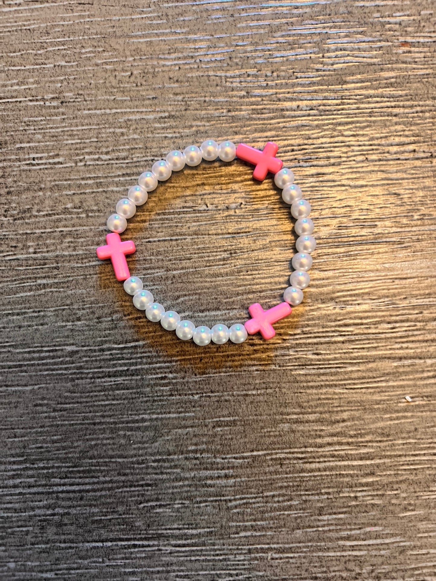 Pink cross bracelet